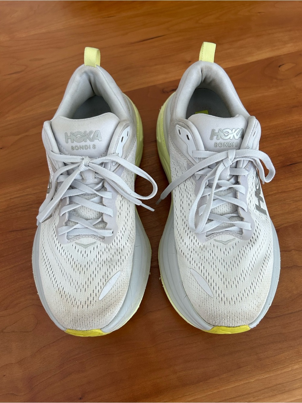 Hoka Bondi 8 Athletic Shoes in Light Gray and Yellow